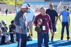 SCJAAF Conference President, Charlie Valencia, presenting Championship Trophy to Chris Mercadal