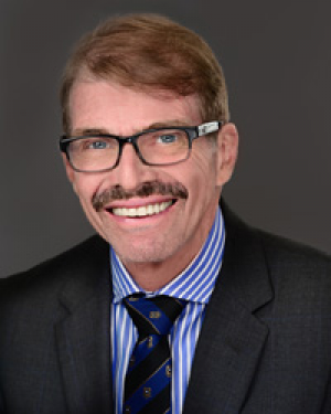 Bruce W. Austin, BDSC, FRACDS, MDSC, an Oral and Maxillofacial Surgeon with Vintage Surgical Specialists