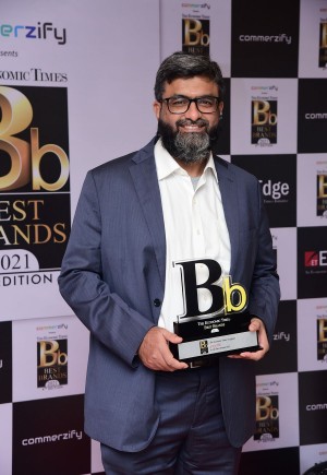 Mr. Sayeed Anjum, Co-founder and CTO of Greytip Software, accepting the recognition on behalf of the company.