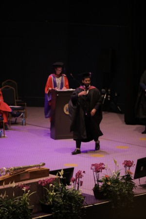 Engineer ZR Saimun receiving a prestigious award for his contributions to cybersecurity research.