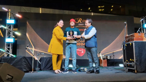 P S GAYEN receiving the Award