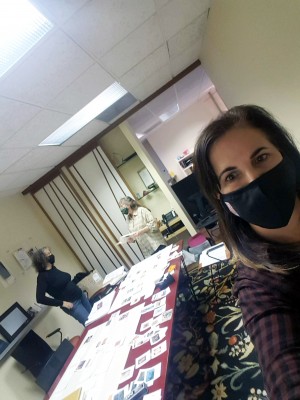 Carol Neiger, Susan Dickman, and Berit Engen, working on Haggadah layout