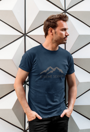 t shirt mockup of a bearded man posing in front of a patterned wall m4201 r el2