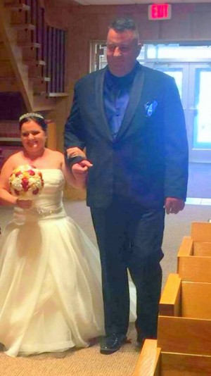 Mini (at wedding to Chad) with Dad