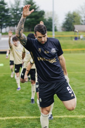 BGFC player Peyton Netherton (11) advances with the ball during a match photo by: Fahad Alotaibi