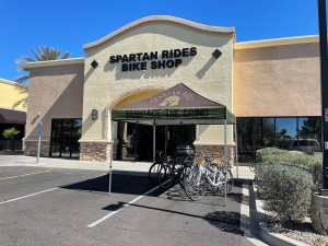Owner JR Duart with mechanic Polo Mendoza and C Lee after a custom wheel build.