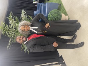 Bishop Victor Couzens with a woman