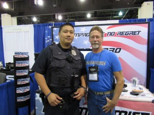 Founder and Inventor, Eddie Massaro with a 1st Responder at a Trade Show.