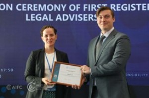 Mr Tkachev Collecting Certificate for Mr Beer