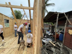 Darren digging holes for the pillars