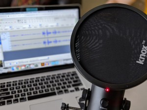 Recording an episode of the Podcast.