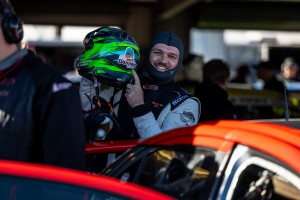 Dominic age 12 cancer patient on Jimmy Vernon s helmet in the pit