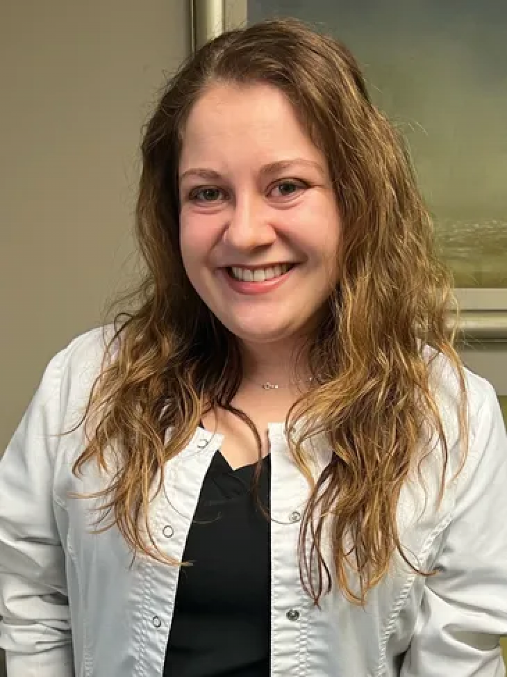 Emily A. Markwood, DMD, a Dentist with Caring Family Dental IssueWire