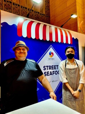 image2K-Food Ambassador Mike Drake (left) with Korean Street Seafood staffer