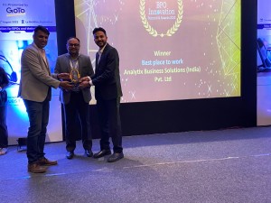 Team Analytix Solutions being felecitated Best Place to Work award 2