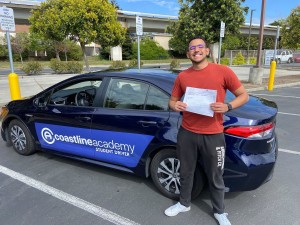 Coastline Academy student is all smiles after passing their road test at DMV office.
