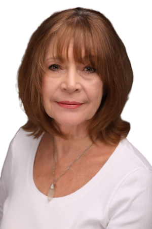 Vicki Michelle plays Angie Edwards