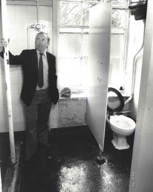 Headmaster David Walker from 1988 inspecting the showers