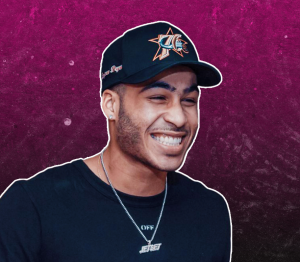 Josh King JetSet Madrid smiling with purple background