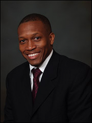 Mohamed L. Saccoh, DDS, FAGD, FICOI, a Dentist in private practice