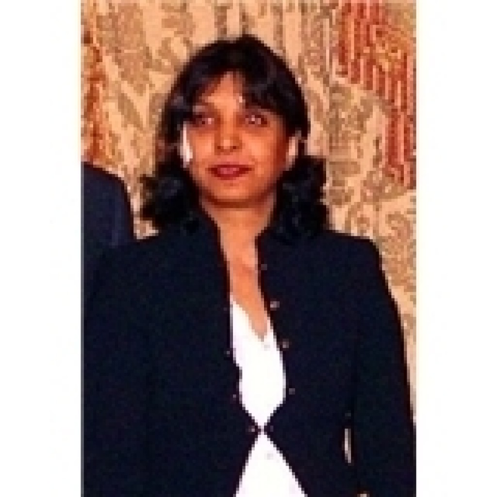 Sandhya Nayak, MD, FACOG, an ObstetricianGynecologist with Aesthetics