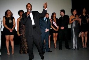 Kenya checks camera set up for recent film with his camera man Brian McLaughlin.