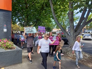 Angry youths take to the streets to protest the closure of their youth mental health service.