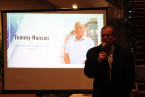 Tommy Hanson speaks to the people at the Art Exhibition