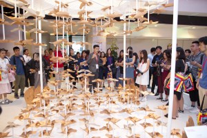 A crowd gathers to hear the story of Autumn