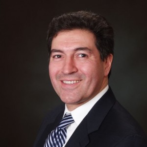 Juan Carlos Mora, DMD, DDS, a Dentist with Mora Family Laser Dentistry