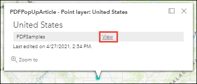 O texto com hiperlink, Exibir, é exibido no pop-up de mapa da web em vez do caminho local. O arquivo PDF pode agora ser acessado clicando no link.