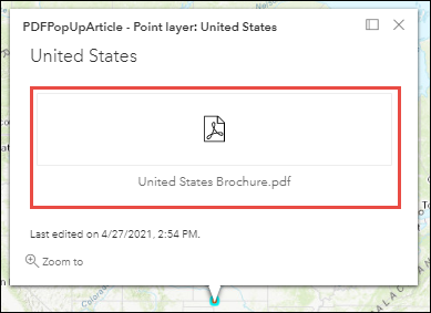 No Map Viewer, o arquivo PDF é exibido como um anexo no pop-up no mapa da web. O anexo pode ser acessado clicando no anexo.