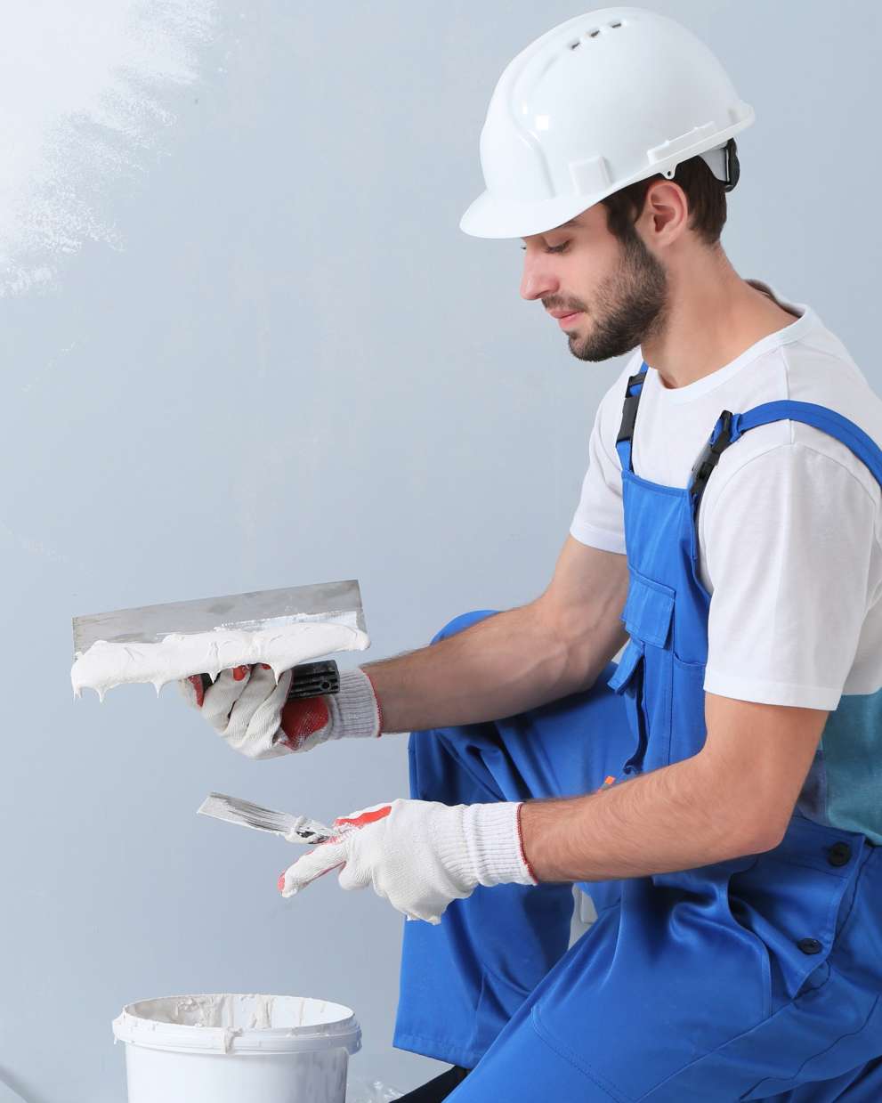 Careers Page Sign, Billboard, and Display Background Image A Sign, Billboard, and Display worker installs a sign in a hallway