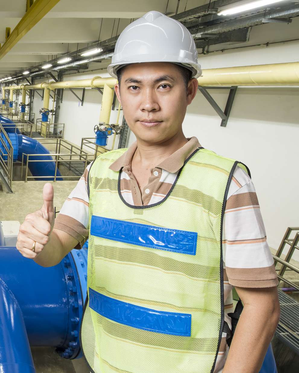 Careers Page Sign, Billboard, and Display Background Image A Sign, Billboard, and Display worker installs a sign in a hallway