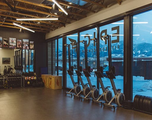 Epic Fitness Center building exterior with Epic logo in the window and a wing logo on the side of the building