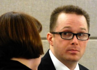 Defendant Christopher Strawn listens to his defense attorney Eve Soutiere during jury selection in his homicide trial in Juneau in February 2017.