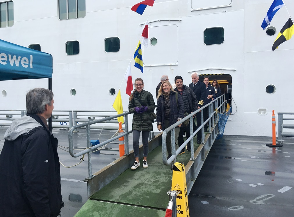 The Borda family disembarks from the Norwegian Jewel on Monday, Sept. 25th. Candy Borda is Ketchikan’s 1 millionth cruise visitor for 2017. (Photo by Leila Kheiry/KRBD )