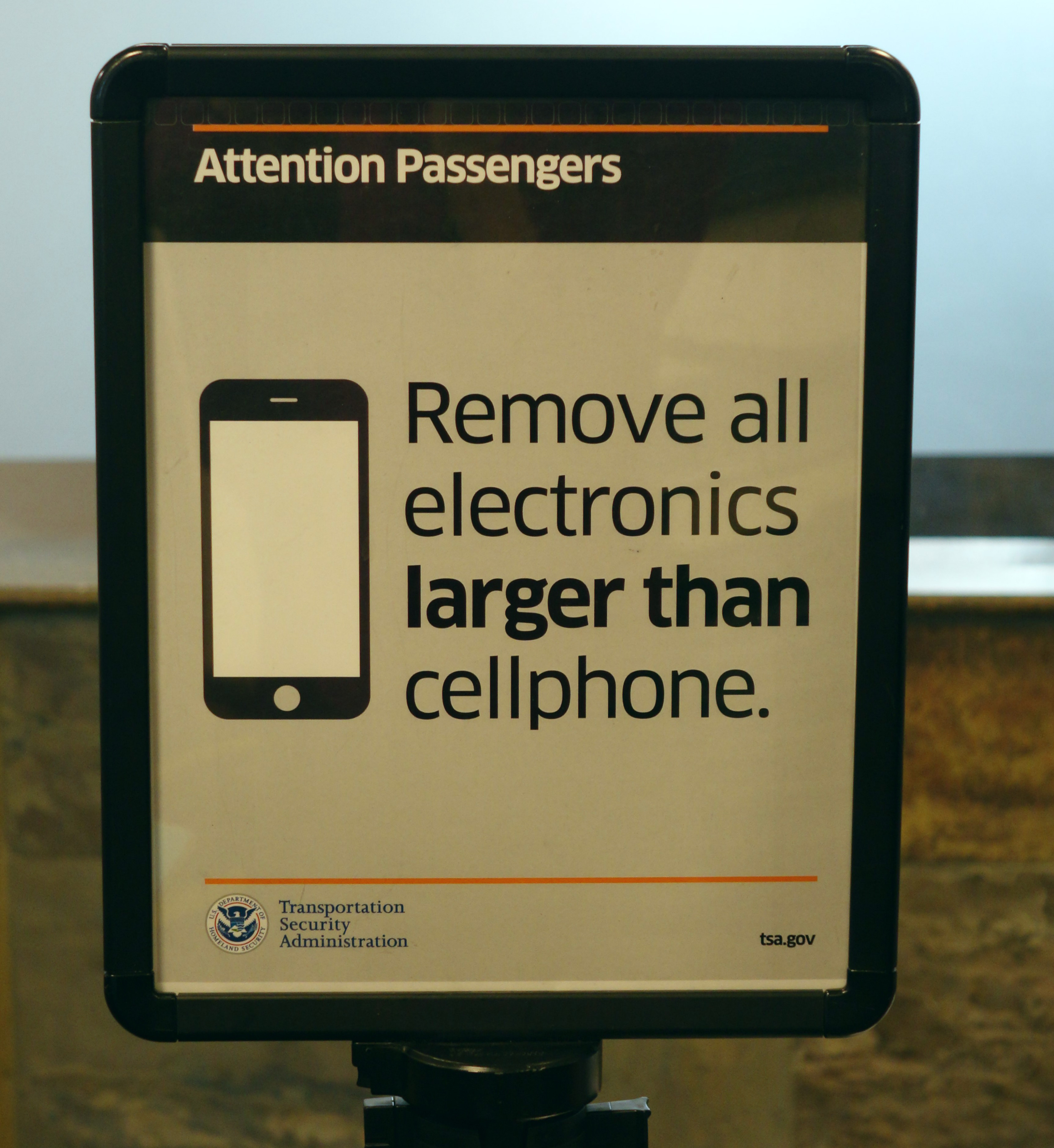 Juneau airport security ELECTRONICS SIGN 20171011 KTOO
