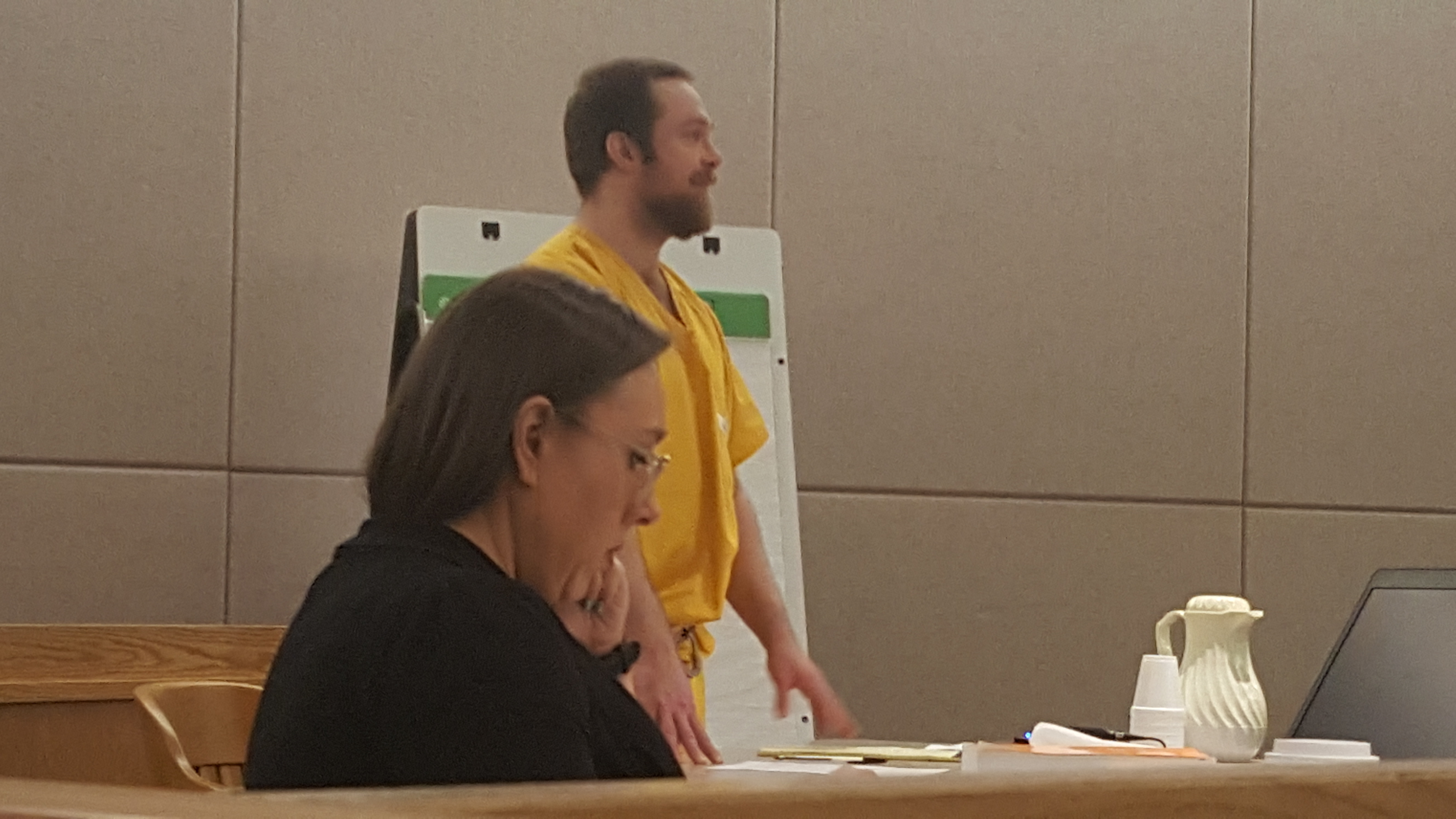 Assistant District Attorney Amy Paige listens as as Christopher Strawn speaks during his sentencing hearing Wednesday, June 20, 2018, in Juneau Superior Court. Strawn was sentenced to 88 years in prison in the murder of Brandon Cook. (Photo by Tripp J Crouse/KTOO)