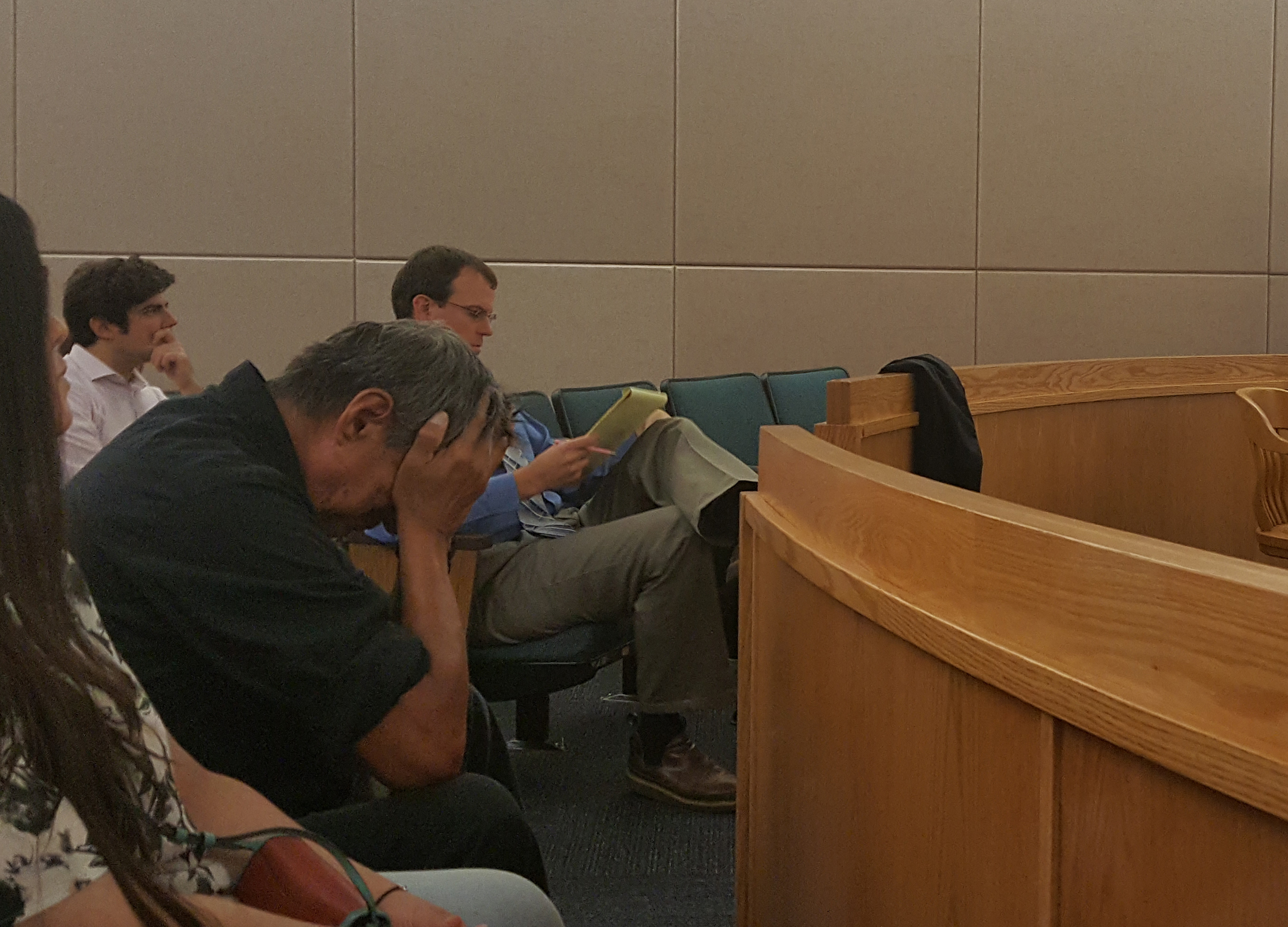 Brandon Cook's father, Donald Cook, listens during Christopher Strawn as he speaks during his sentencing hearing Wednesday, June 20, 2018, in Juneau Superior Court. (Photo by Tripp J Crouse/KTOO)