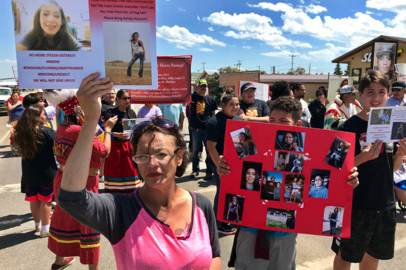 Loxie Loring walks with a group of marchers to remember her daughter, Ashley Loring, who went missing from the Blackfeet Reservation more than a year ago. (Photo by Nate Hegyi/Yellowstone Public Radio)