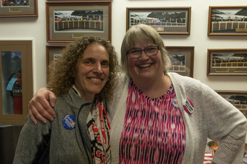 Juneau mayoral candidates Saralyn Tabachnick, left, and Beth Weldon pose after Weldon's apparent election night victory on Tuesday, Oct. 2, 2018, at City Hall.