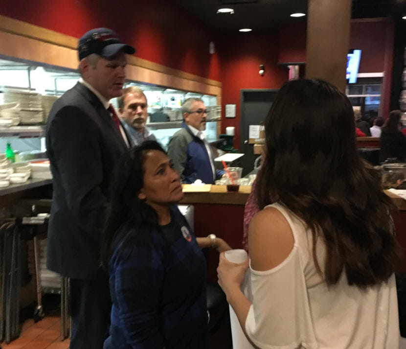 Gov.-elect Mike Dunleavy talks with family members on election night. His wife Rose Dunleavy, center, is from Noorvik, where Mike Dunleavy will be sworn in as governor on Dec. 3. Nov. 6, 2018. (Photo by Andrew Kitchenman/KTOO and Alaska Public Media)