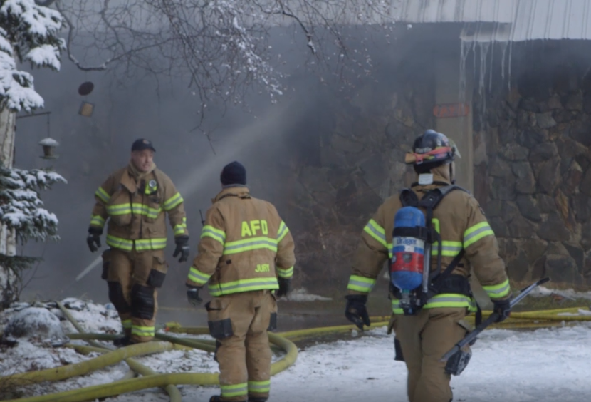 Anchorage Fire Department firefighters respond to a call after an earthquake rocked Anchorage on Nov. 30, 2018. (Video still by Joey Mendolia/Alaska Public Media)