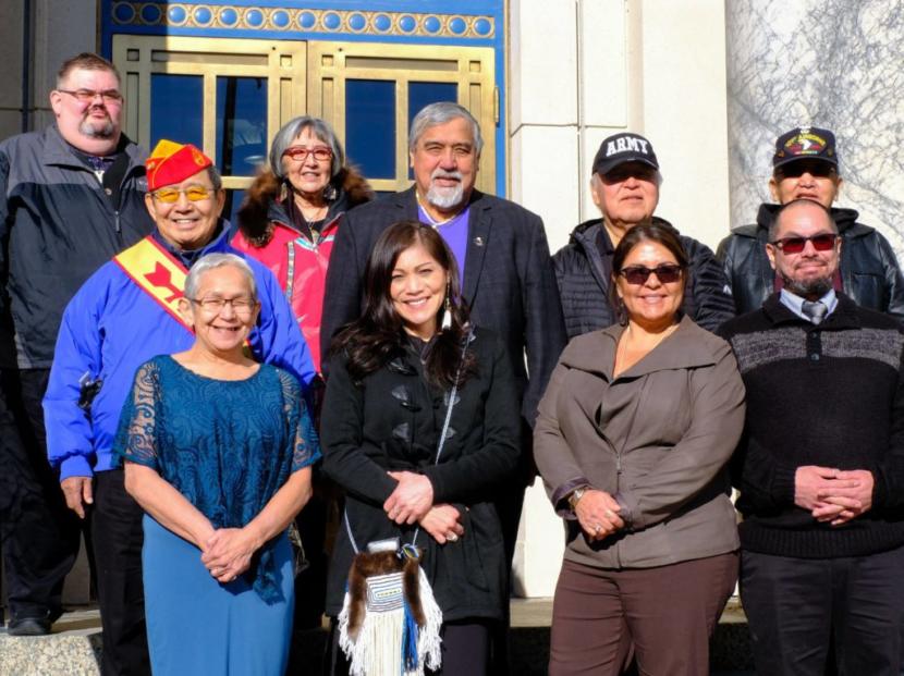 Representatives from Sealaska Heritage, Alaska Native Brotherhood, Central Council of Tlingit & Haida and descendants of the five known Tlingit code talkers on the steps of the capitol on Wednesday.