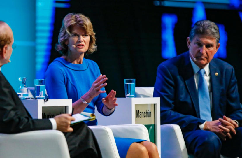 Sens. Lisa Murkowski, R-Alaska, and Joe Manchin, D-W.Va., shown here at 2019 CERAWeek, are talking a lot about climate change.