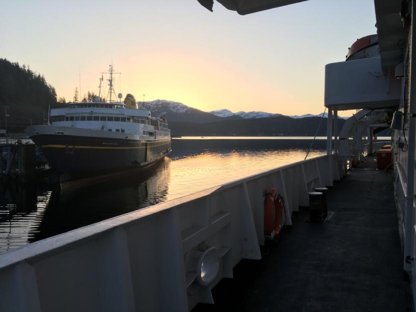 The MV Malaspina sits at the dock in Auke Bay, near Juneau, as the MV LeConte pulls away from the dock early Thursday. Both ships are part of the Alaska Marine Highway System.