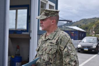 Senior Chief Petty Officer Brandon Raile stands on Kodiak’s Pier 2 outside the USS Comstock, Sept. 10, 2019.