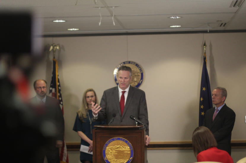 Alaska Gov. Mike Dunleavy speaks at a news conference at his Anchorage office on Friday, Sept. 27, 2019.