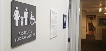 English and Lingít bathroom sign at Juneau-Douglas City Museum
